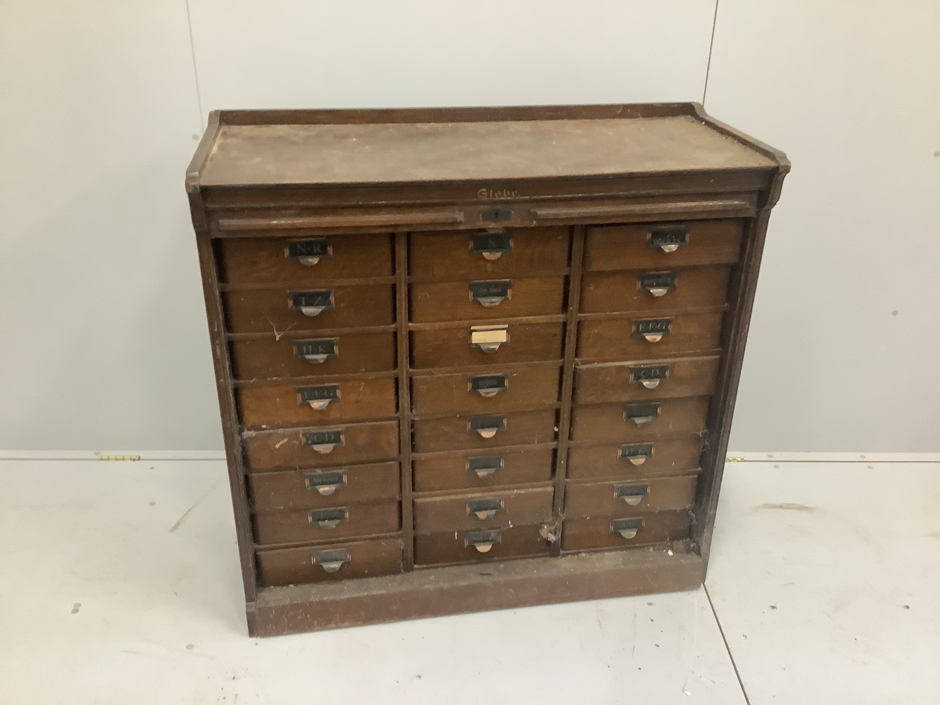 An early 20th century oak Globe Wernicke office filing cabinet with tambour front, width 106cm, height 104cm